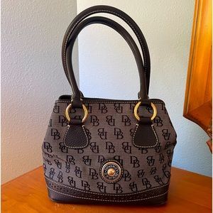 Medium Dooney and Bourke handbag and navy blue and brass